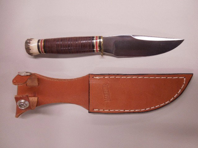 Leather & Stag Handle Hunting Knife: Leather and stag handle hunting knife made by marbles. 4 1/2" blade with sheath. CONDITION: Like new.