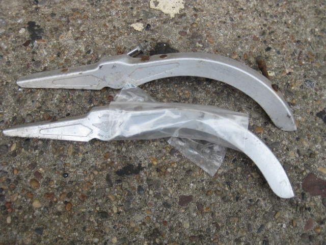 Lot of 2 Simplex aluminum chainguards: Lot of 2 aluminum simplex chain guards one is in excellent used condition. The other is in good used condition missing parts. 11” long X ½” wide X 4” max. Height. Made in France in the 1960’s
