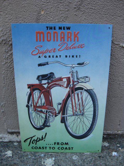 Reproduction Monark bicycle metal sign (1 of 2)