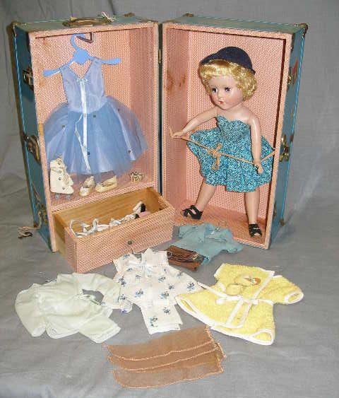 Vintage plastic doll with travel case