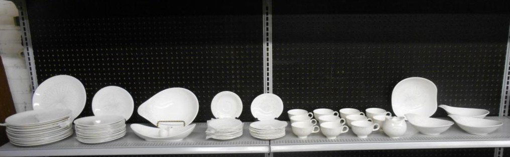 Hallcraft Dawn Pattern Dinner Service: Mid-century modern era The Hall China Company sixty-none piece Hallcraft Dawn pattern pottery dinner service designed by Eva Zeisel, includes: sixteen 11 1/8" (l) dinner plates, fourteen 8 5/8" (l) sa