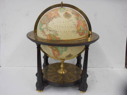 Franklin Mint 1st Edition World Globe: 1986-1987 Franklin Mint First edition 19" (h) x 16 3/4" (l) x 16 3/4" (w) mahogany and brass Royal Geographical Society World Globe. CONDITION: Areas with wear.