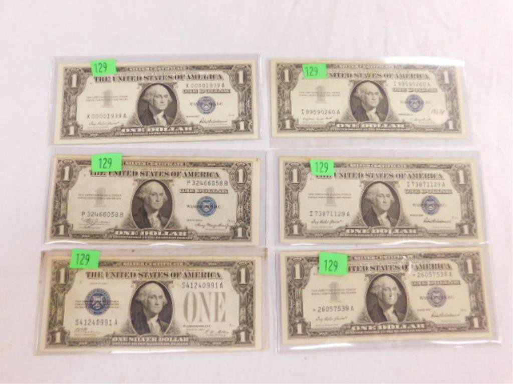 Six $1 silver certificates (1 of 2)