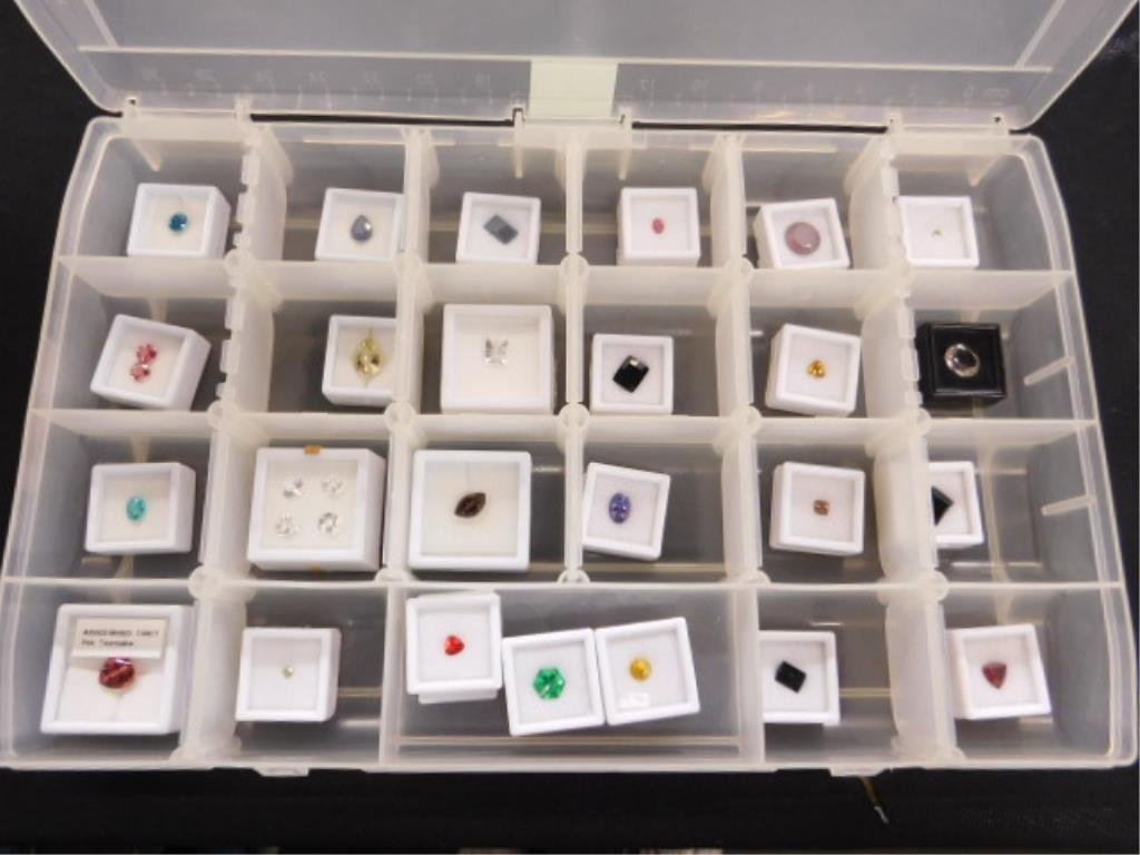 Tray of Many Gems.: Tray includes aprx. 25+ various gems of larger cuts including, steps, round, oval, and more. Gems include various colors of tourmaline, synthetics, petalite, beryl, zircon, etc.