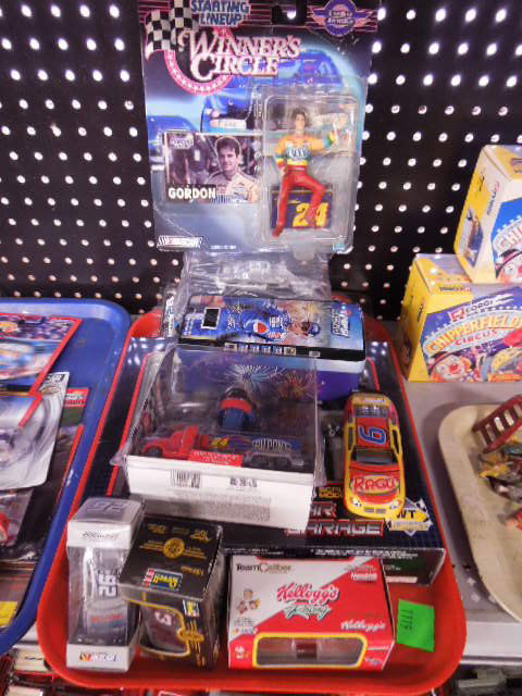 Lot of Assorted Nascar Collectibles: Lot of assorted Nascar collectibles, includes: diecast, playset, figure and Pez dispenser. CONDITION: Good.