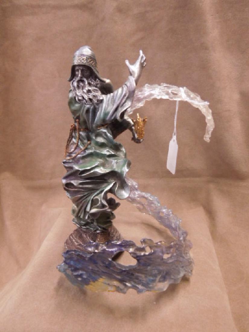 Franklin Mint Pewter Wizard Sculpture: Franklin Mint Pewter Wizard Sculpture, hand painted with gold accent and jewel eye dragon staff, plastic swirl around Wizard detached, no crystal base, 9 1/2'h. CONDITION: Bottom half of staff missing