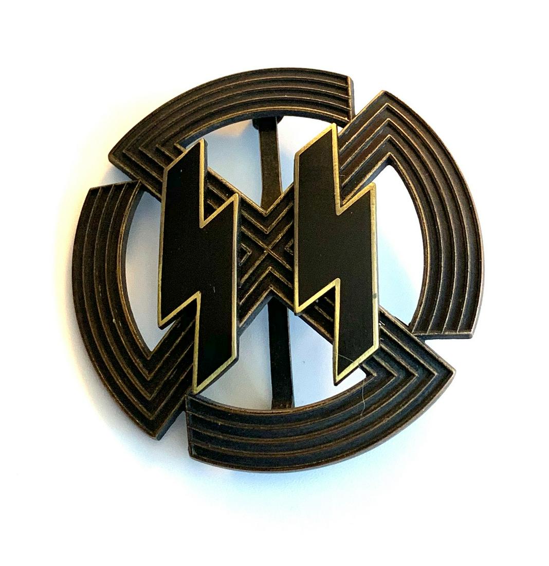 GERM WAFFEN S.S. PROFICIENCY BADGE ENAMEL RUNES: Measures 2+ in diameter. Maker marked Richard Sieper & Sohne Ludenscheid RZM M1/25. Has a pair of black enameled runics on the front. Has a wide vertical pin back. Possible a quality reproduction.