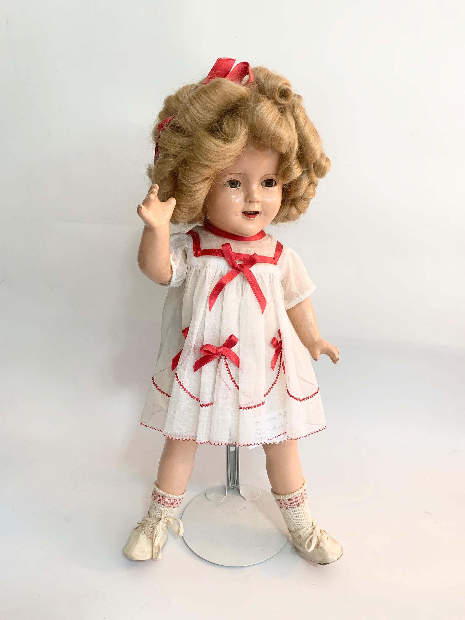 B3: Shirley Temple Doll #17: Shirley Temple Doll 17" Composition doll, marked Shirley Temple 17 on the back, the head is marked Shirley Temple with maker which I believe is Ideal. We do our best to list all possible flaws, these