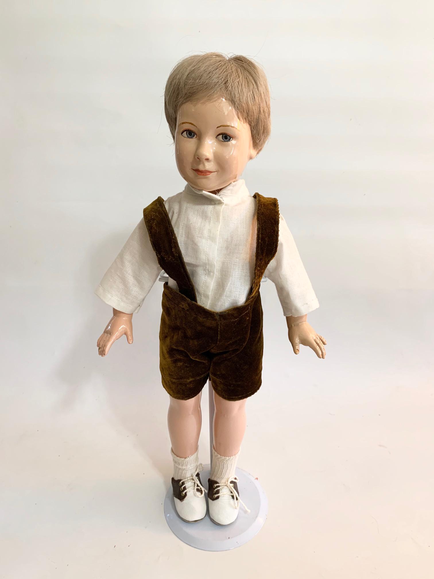 B4: Effanbee Boy Doll American Child Dewees Cochran: Effanbee Boy Doll American Child; Dewees Cochran; in very good condition; face may have been repainted we are unsure; Replaced velveteen shorts with susenders; replaced wig.