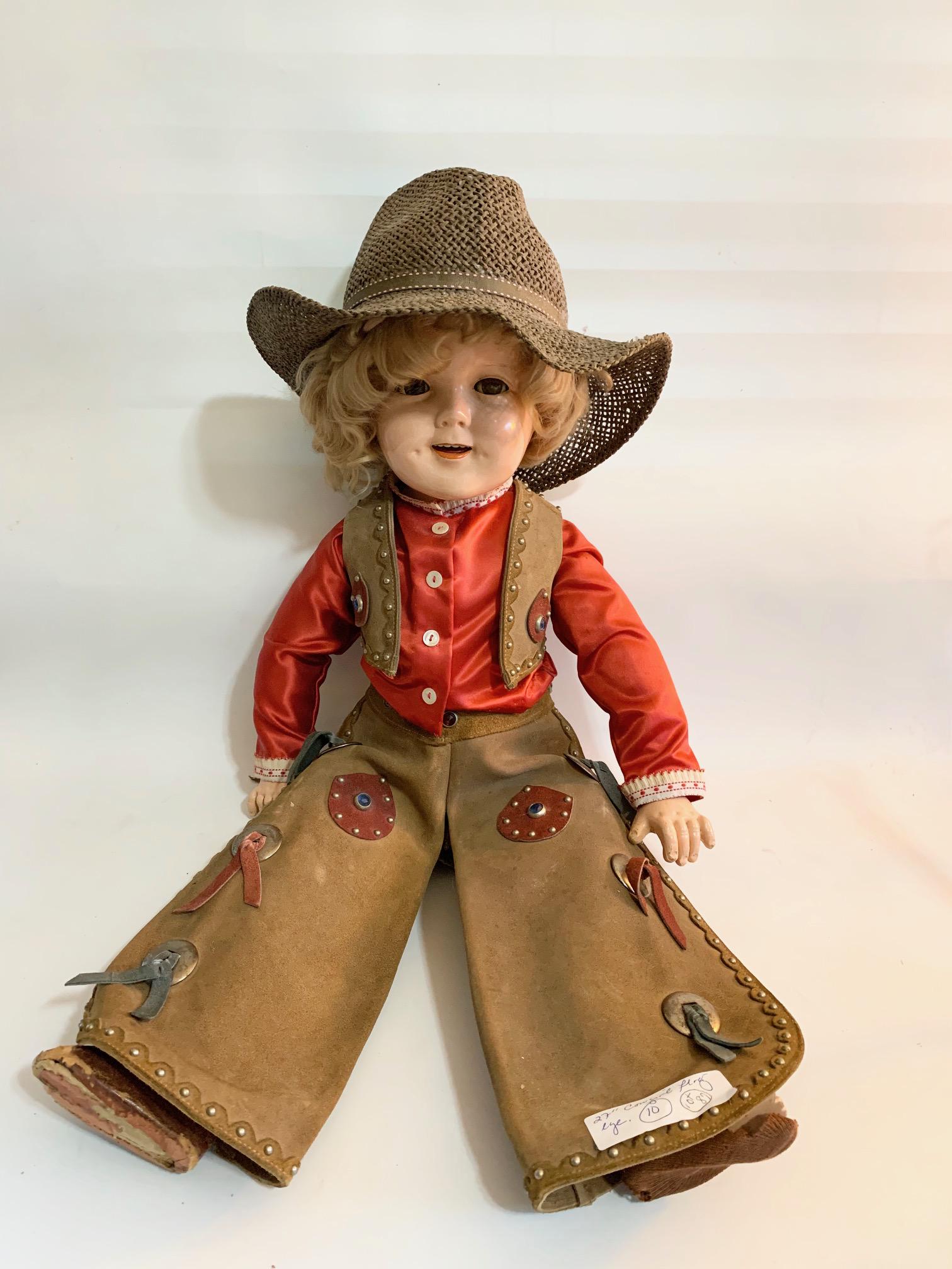 B6: Shirley Temple Cowgirl 27" Composition Flirty Eyes: Shirley Temple Cowgirl 27" composition doll with flirty eyes; Original vest and chaps; replaced shirt and hat; no gun or holster; one boot missing; wig probably not original. We do our best to list al