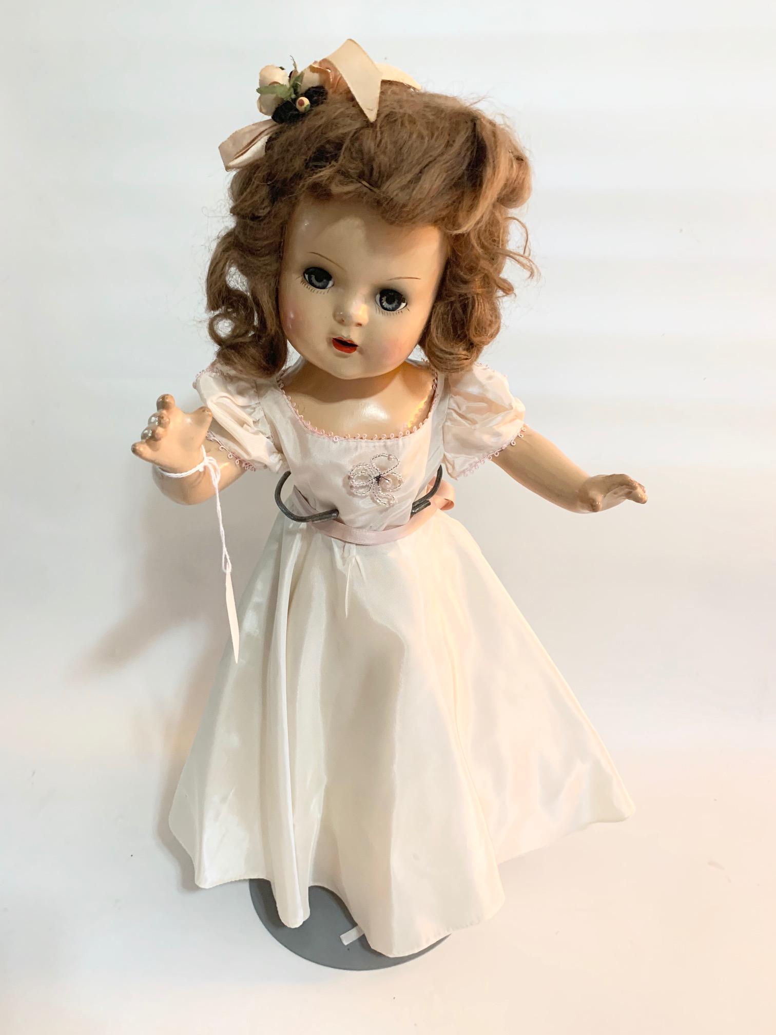 B7: Priness Style 18" Composition Doll unknown maker: Princess Style 18" Composition Doll; unknown maker; original firy princess dress; original underwear and original wig. We do our best to list all possible flaws, these are vintage/antique dolls and ar