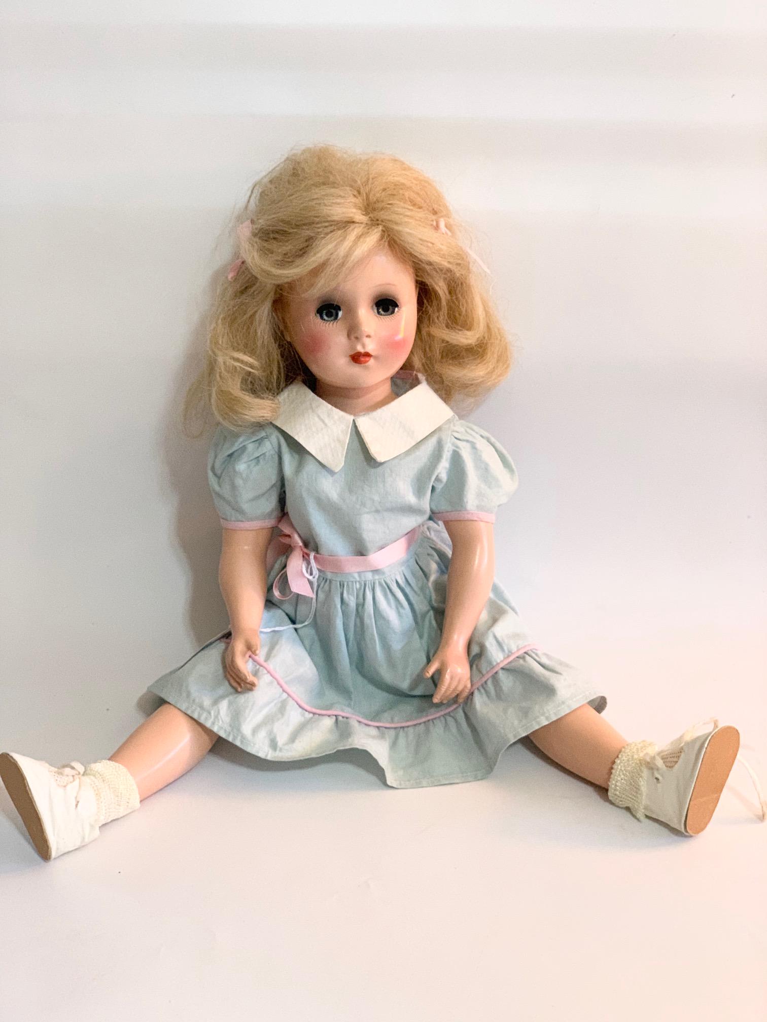B10: Marion-Monica Doll Hollywood Doll 18" Hard Plastic: Marion-Monica Doll by Hollywood Doll Co; hard to find doll with original blond rooted hair; original blue dress. We do our best to list all possible flaws, these are vintage/antique dolls and are NOT 