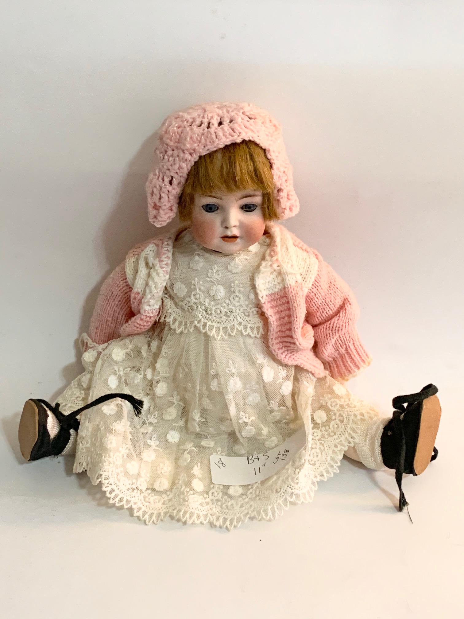 B11: Bruno Schmidt #1295 11" Bisque Girl Doll: Bruno Schmidt #1295 11" Bisque Girl Doll; blue sleep eyes; body correct jointed toddler; body marked FS&C; old wig, partially gone. We do our best to list all possible flaws, these are vintage/antique