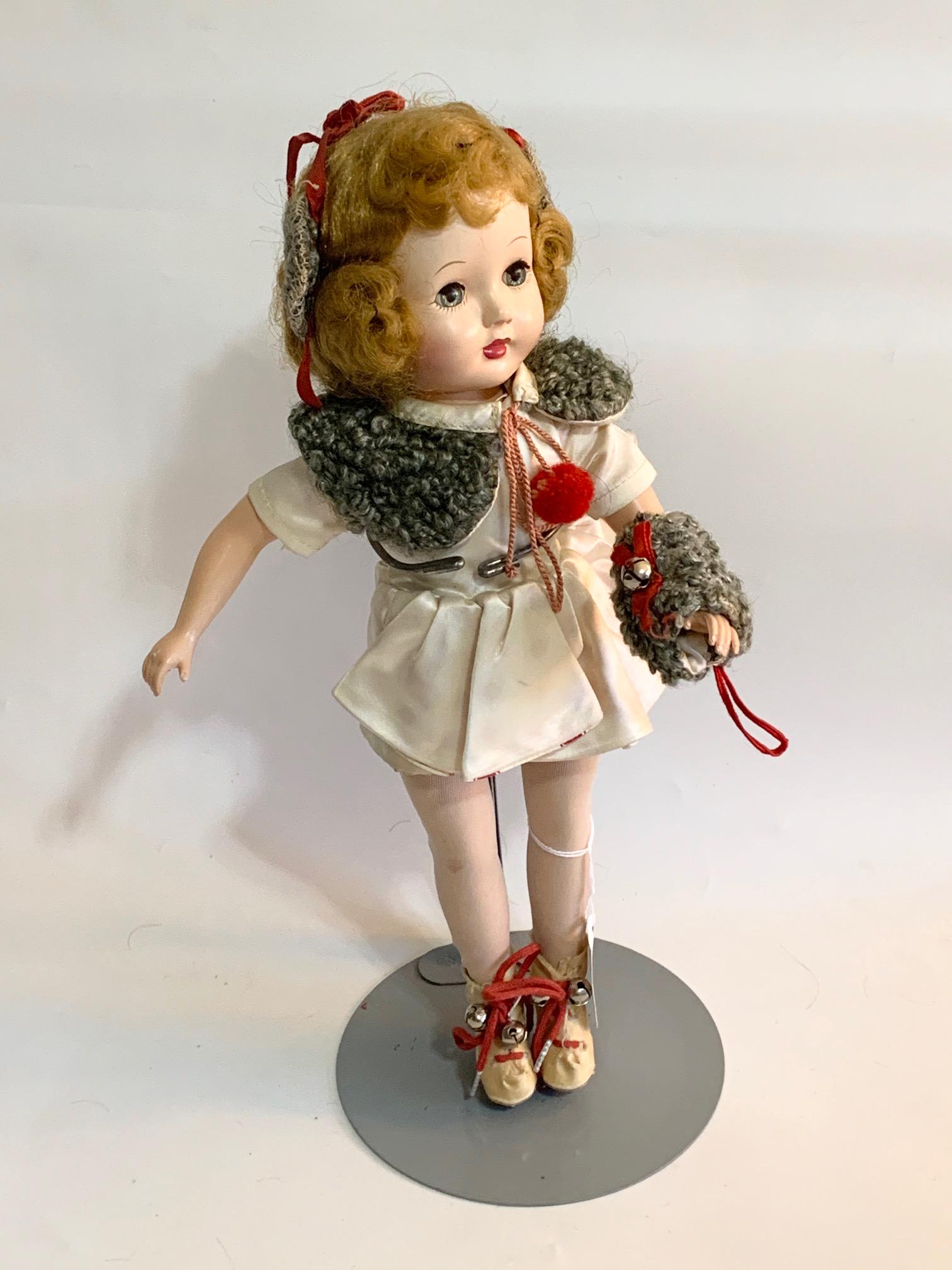 B12: Effanbee Honey Walker 14" Hard Plastic Doll: Effanbee Honey Walker 14" Hard Plastic Doll; original ice skating outfit with mouton collar, matching ear muffs and mittens; original wig. We do our best to list all possible flaws, these are vintage/