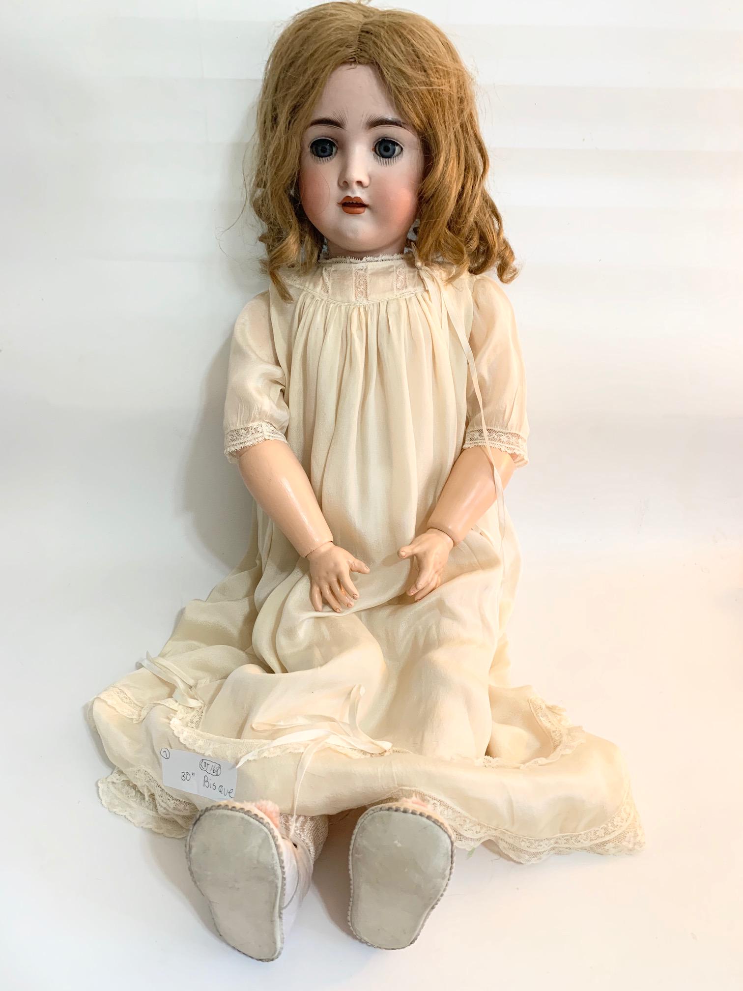 B13: German Girl Bisque Doll #136-30": German Girl Bisque Doll #136-30"; eye chip; face original paint; body repaited; beautiful antique dress; original human hair. We do our best to list all possible flaws, these are vintage/antique dolls