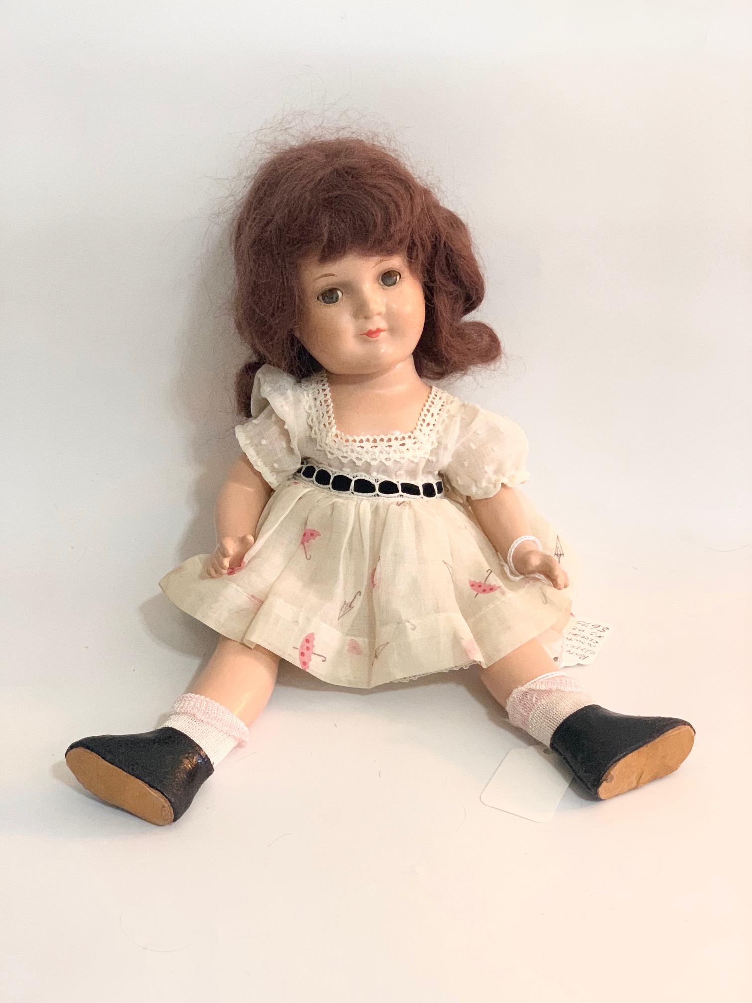B13: Madame Alexander Jane Withers 13" Composition: Madame Alexander Jane Withers 13" Composition Doll; possible minor touch up of eye lashes; original outfit and wig. We do our best to list all possible flaws, these are vintage/antique dolls and are N