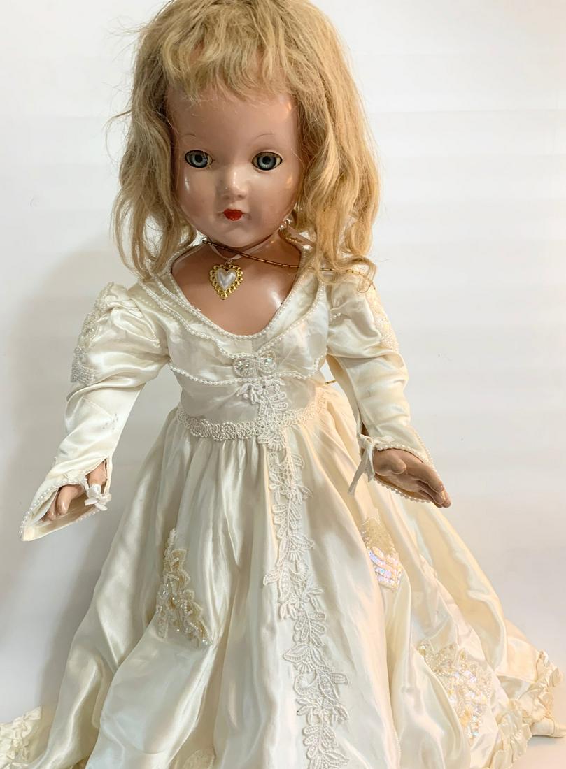 B13: Bride Unmarked Effanbee Anne Shirley Body for: Bride unmarked Effanbee Ann Shirley Body for Little Lady; 26" Composition; original white satin bridal gown added handsewn beaded appliques and lace on skirt and bodice that are not original; replaced