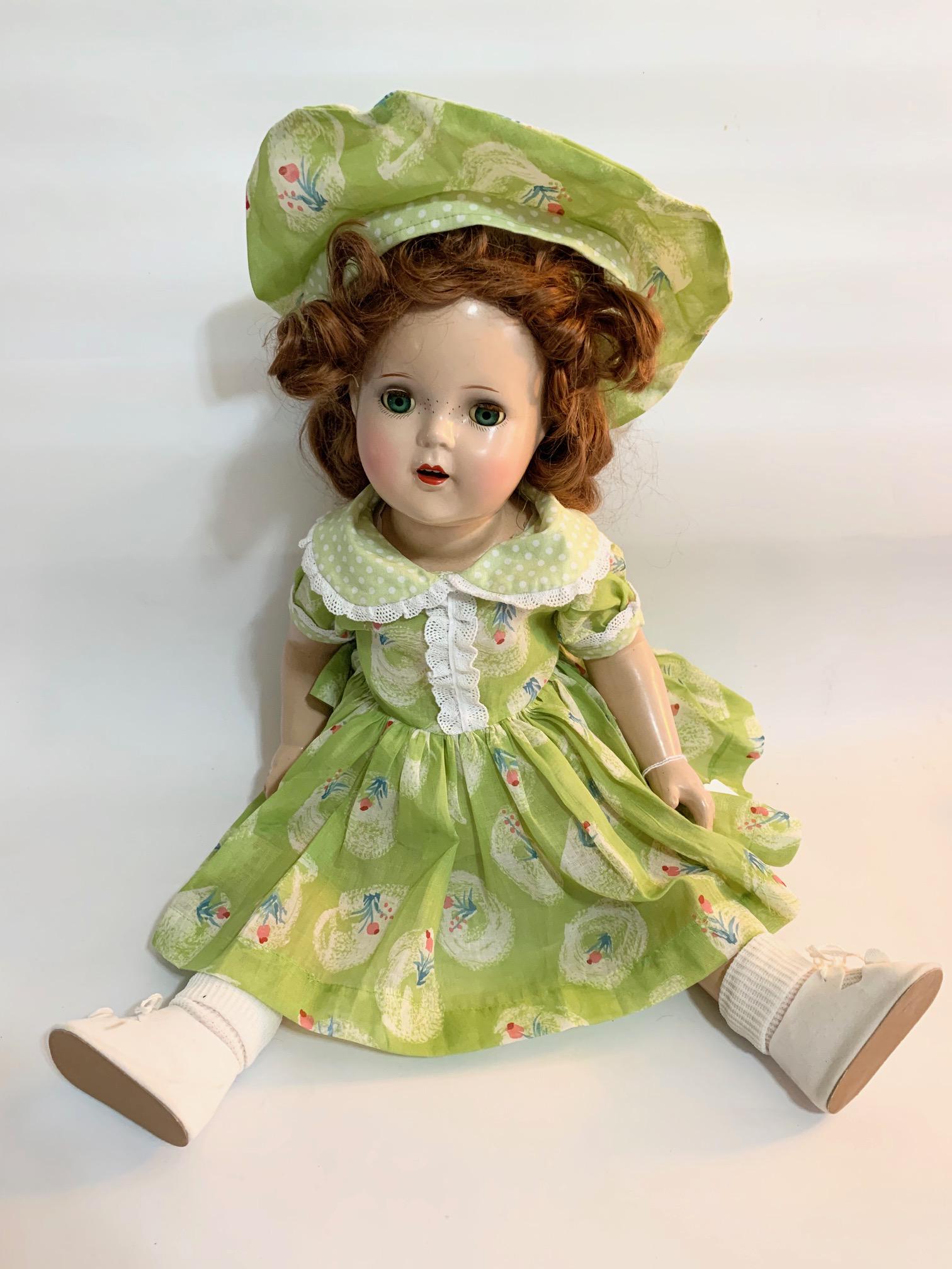 B14: Madame Alexander Flora McFlimsey Princess: Madame Alexander Flora McFlimsey; Princess Elizabeth mold; 23" composition with replaced clothes and hat with original auburn wig. We do our best to list all possible flaws, these are vintage/antique 