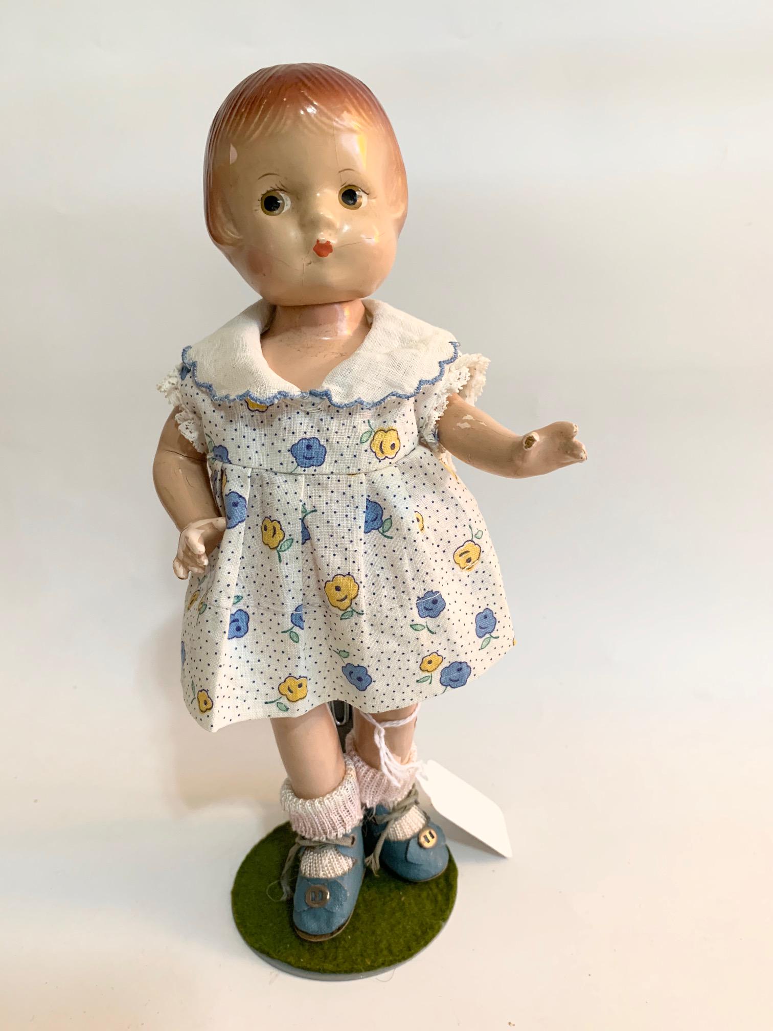 B15: Patsyette 8" Doll: Patsyette 8" Doll; minor paint flaking; replaced old floral print dress; original shoes; painted hair. We do our best to list all possible flaws, these are vintage/antique dolls and are NOT perfect. P