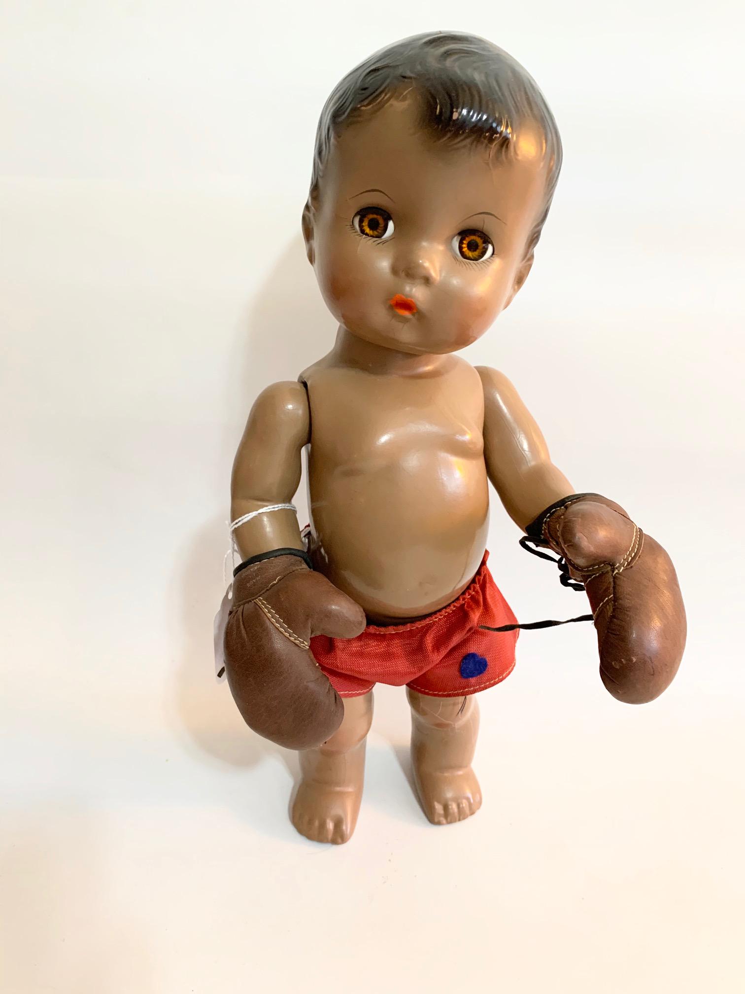 B15: Effanbee Candy Kid Black Boxer Doll 13": Effanbee Candy Kid Black Boxer 13" Composition in good condition; original boxing shorts and original gloves; original molded painted hair. We do our best to list all possible flaws, these are vintage