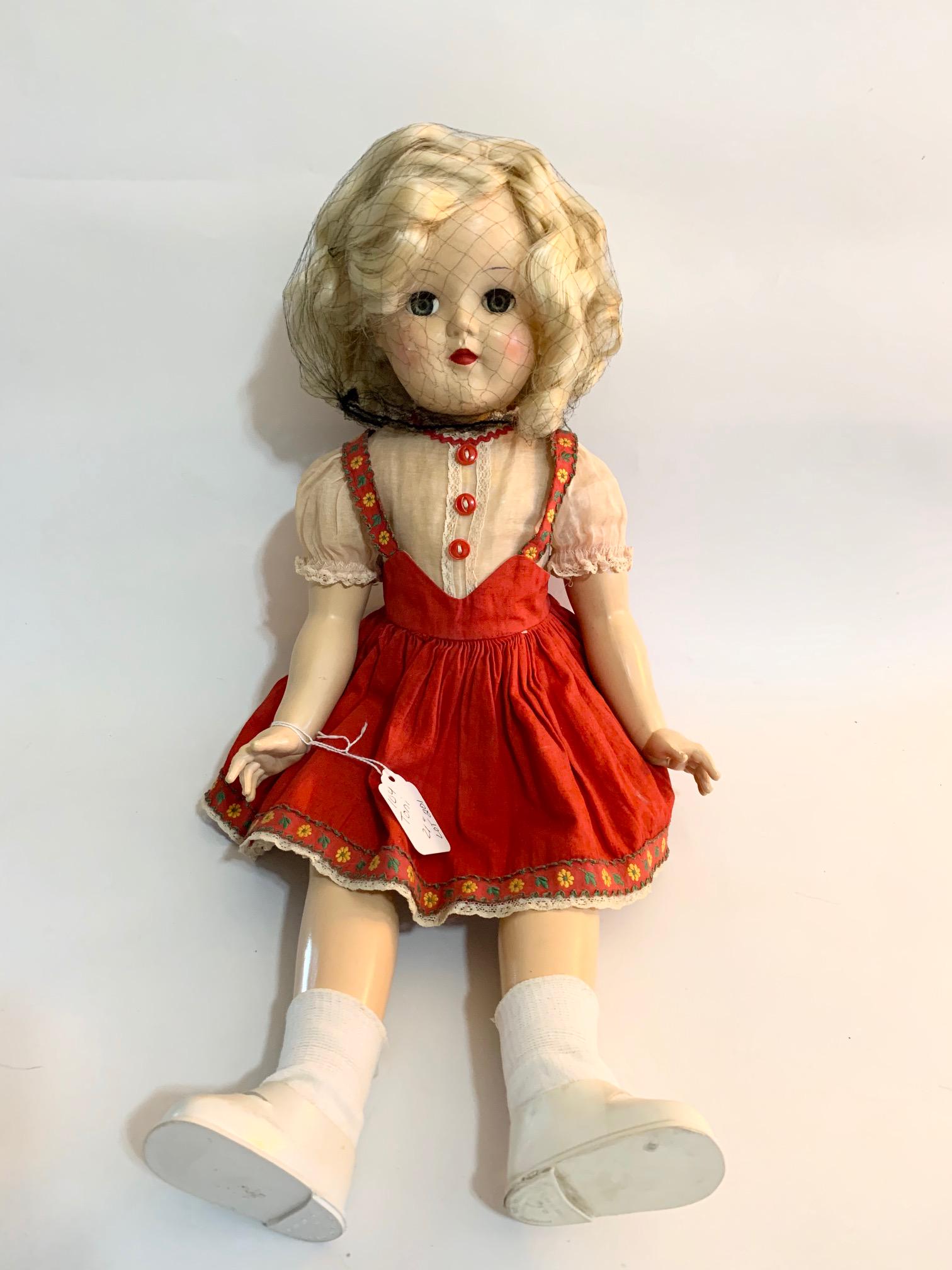 B17: Ideal Toni P93 21" Hard Plastic Doll: Ideal Toni P93 21" Hard Plastic Doll; all original red dress trimmed with embroidery and white organdy blouse; original shoes; original wig. We do our best to list all possible flaws, these are vintag