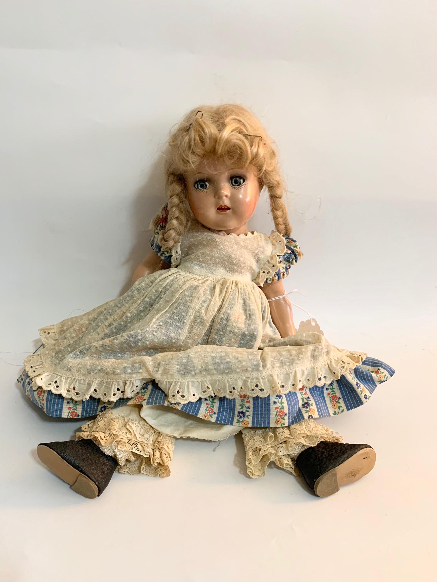B18-Little Girl Vogue Doll 1948-50 15" Composition: Little Girl Vogue Doll 1948-50 15" Composition Doll; dress with Vogue Inkspot tag; original blond wig. We do our best to list all possible flaws, these are vintage/antique dolls and are NOT perfect. P