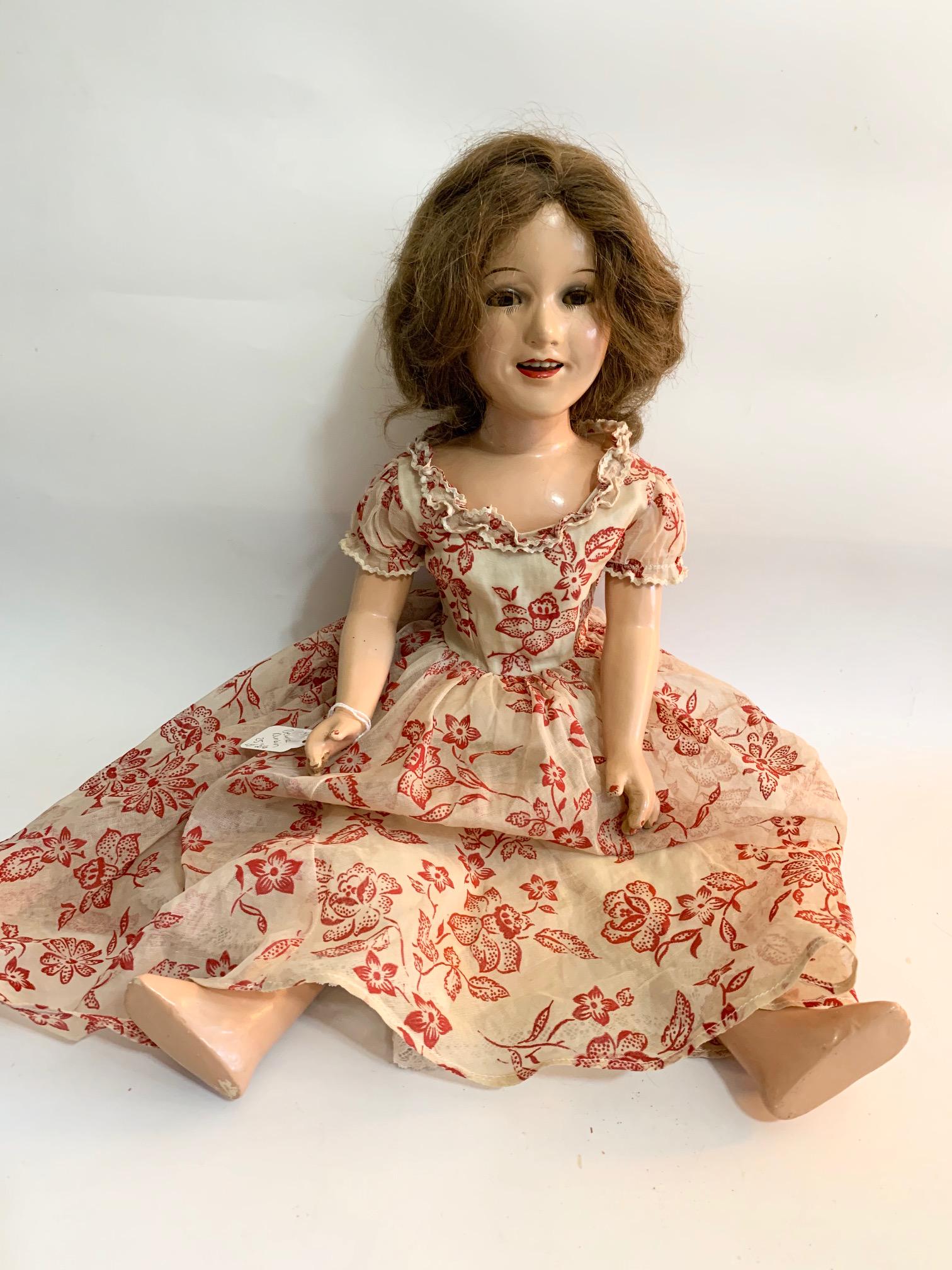 B-18: Ideal Deanna Durbin 20" Composition Doll: Ideal Deanna Durbin 20" composition doll; original paint; face good; two broken fingers; replaced red and white flocked dress; no shoes; original dark bown wig. We do our best to list all possible fla