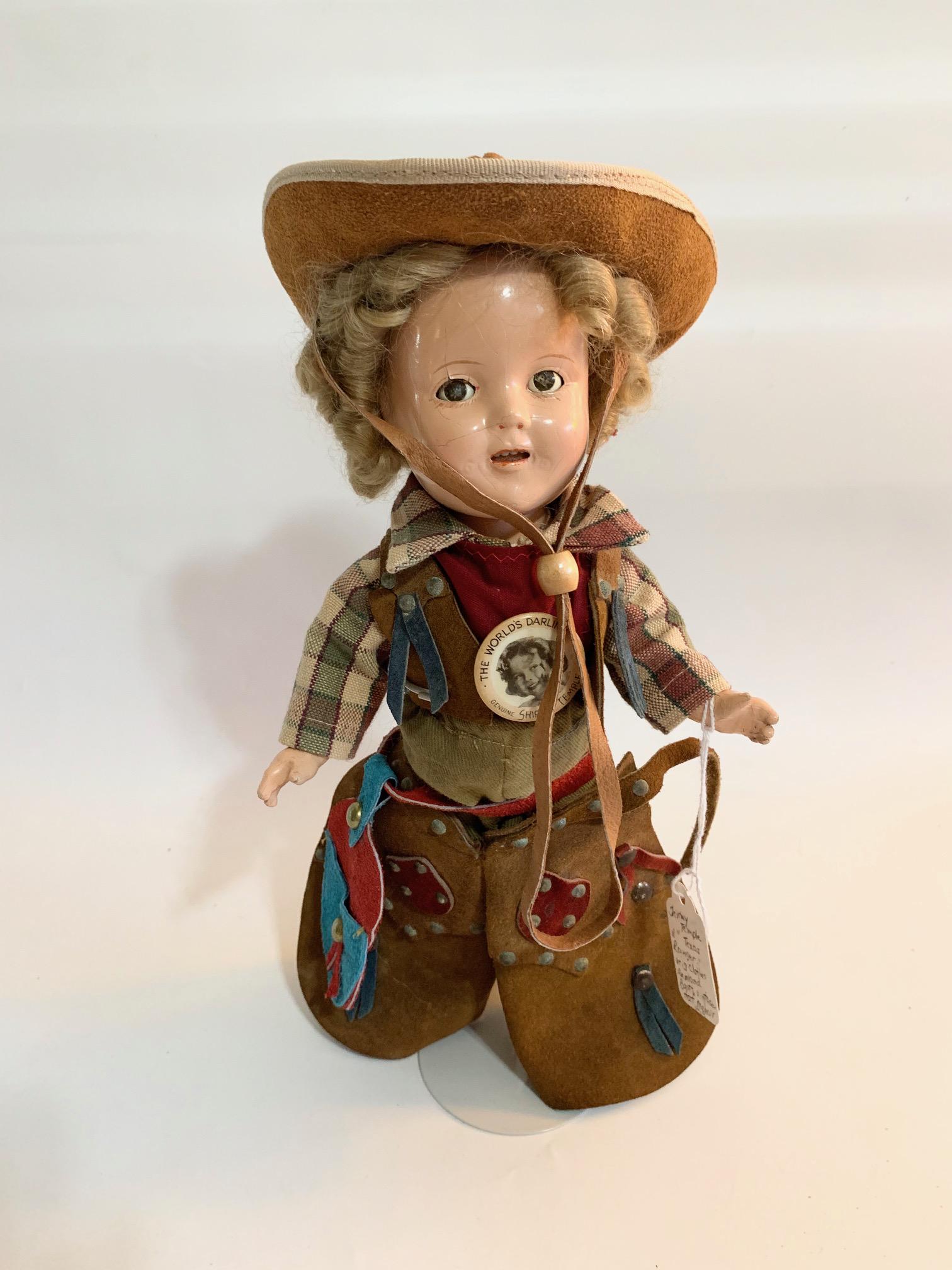 B-19: Shirley Temple Texas Ranger 11" Composition Doll: Shirley Temple Texas Ranger 11" Composition Doll; original clothes, relaced boots; vintage hat and mohair wig, no gun. We do our best to list all possible flaws, these are vintage/antique dolls and ar
