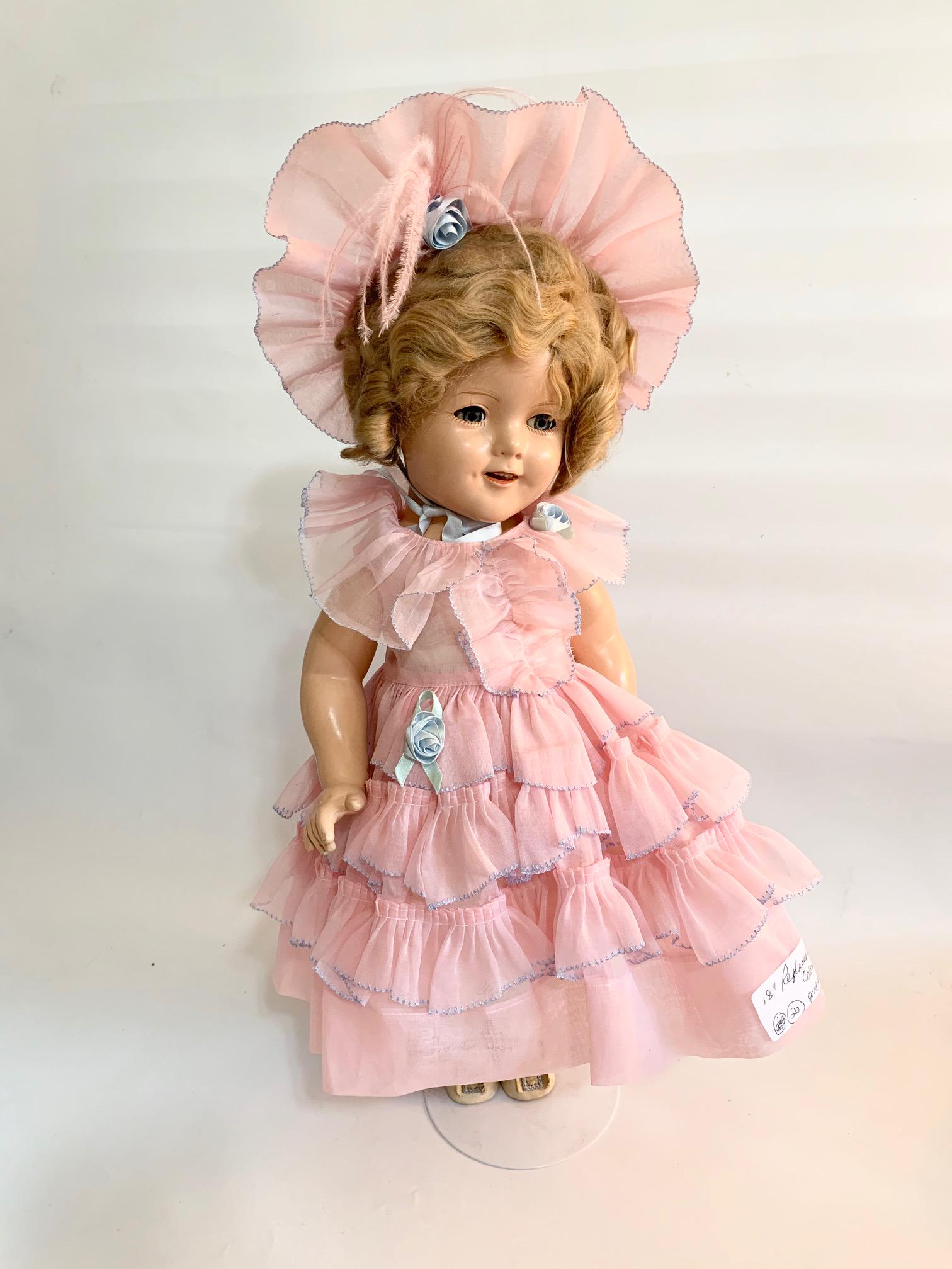 B-19: Shirley Temple Little Colonel 18" Composition: Shirley Temple Little Colonel 18" Composite Doll; replaced clothes;hat;underwear; probably not original wig. We do our best to list all possible flaws, these are vintage/antique dolls and are NOT perf