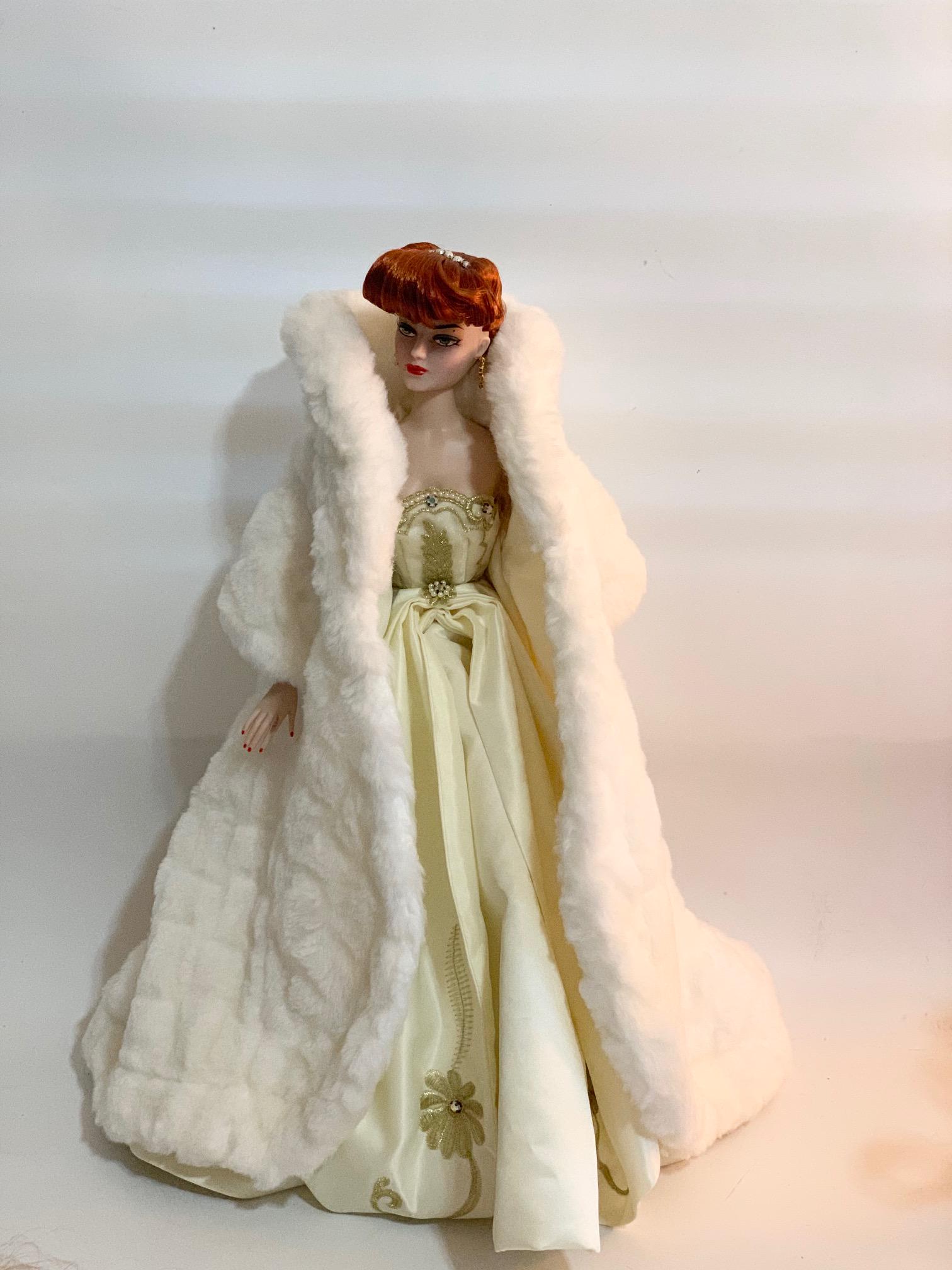 FB-15" Madra Lord-Mel Odom Doll: Madra Lord-Mel Odom Doll 15"; original First Encounter White taffeta embroidered dress with white fur floor length coat; red hair. We do our best to list all possible flaws, these are vintage/antique 