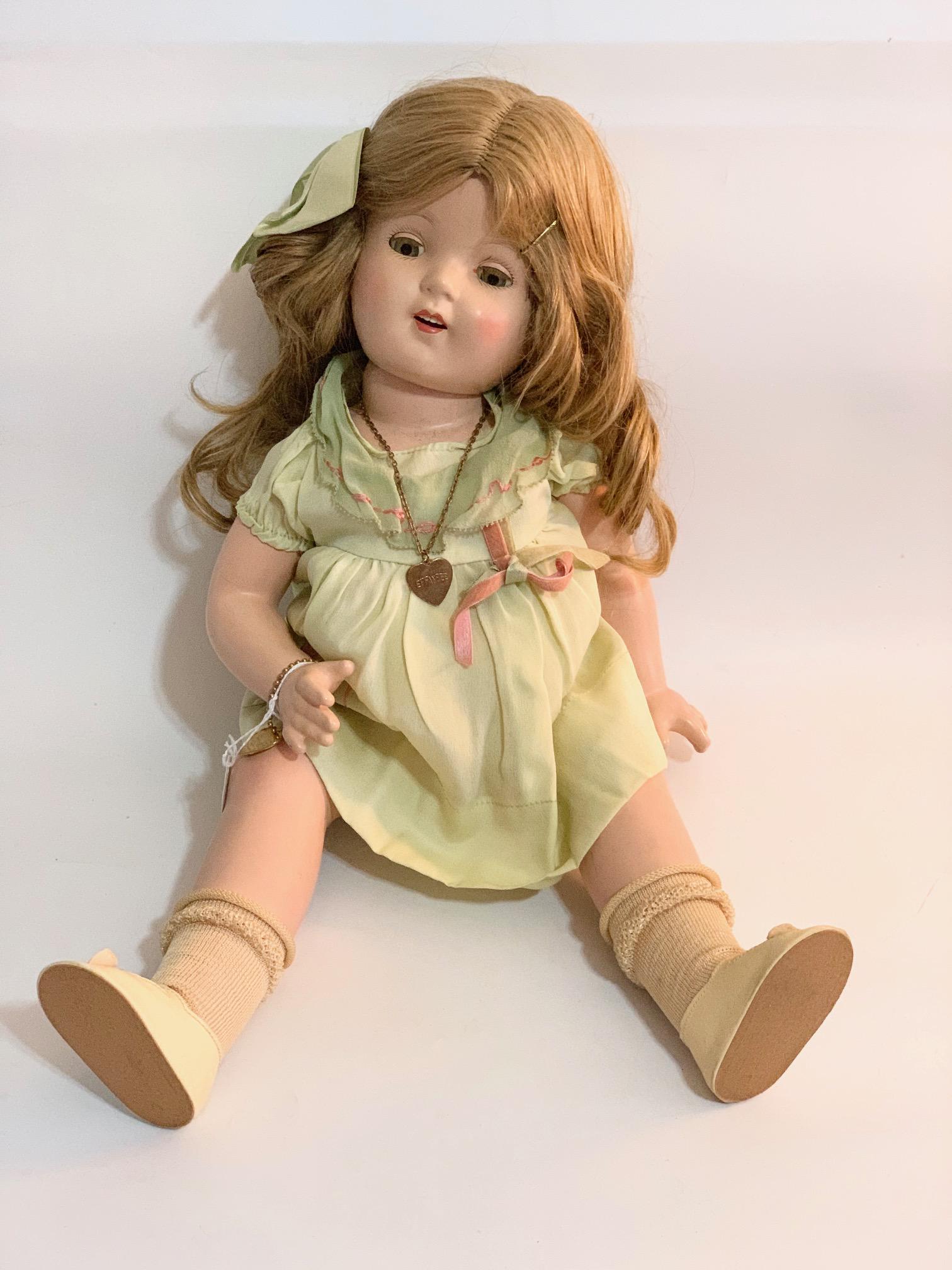 B20: Effanbee Mary Ann 19" Doll: Effanbee Mary Ann 19" Doll with wrist bracelet; original tagged green and white dress; original shoes; may be original wig. We do our best to list all possible flaws, these are vintage/antique dolls a