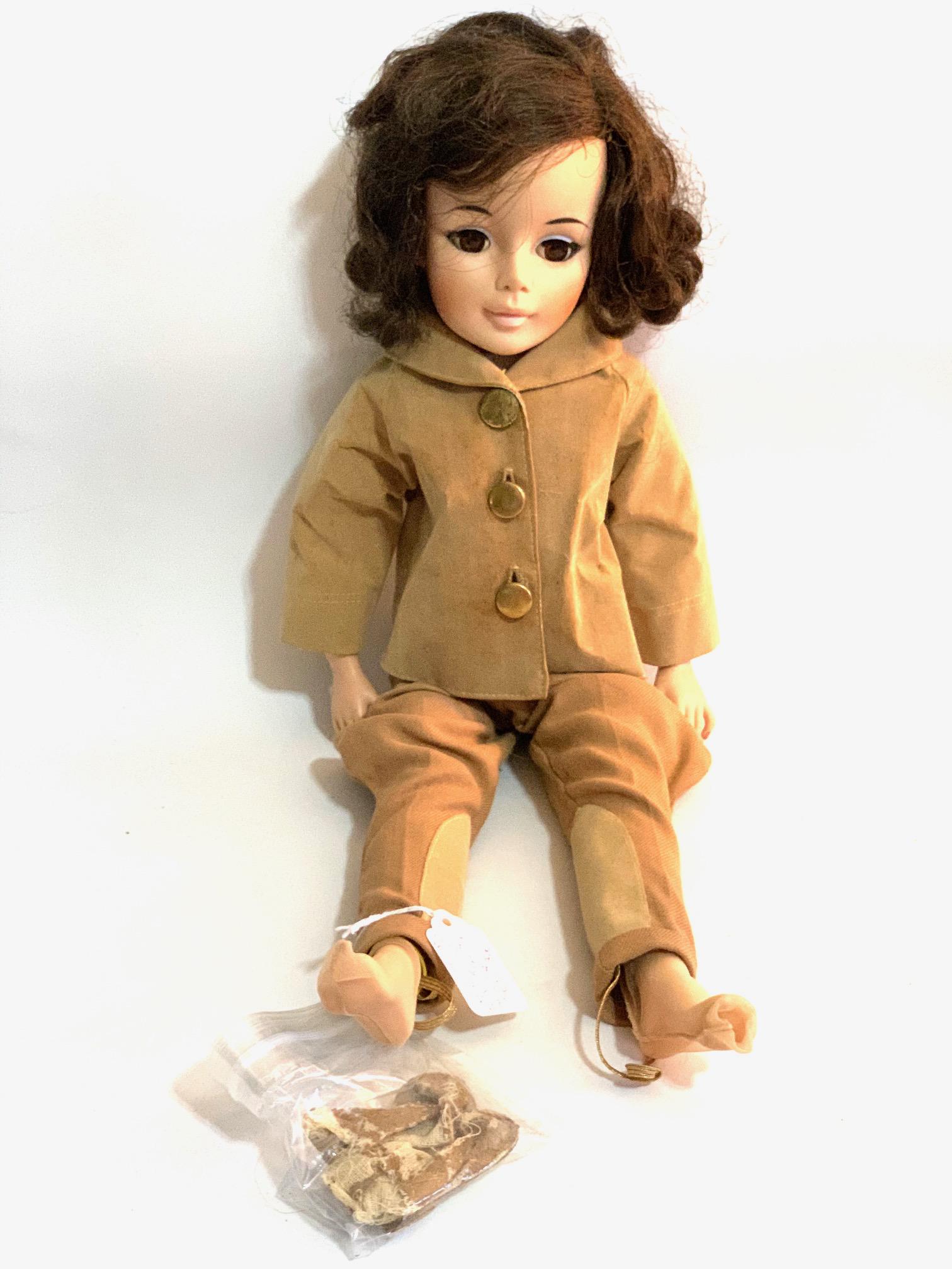 B21: Madame Alexander Jacqueline Kennedy 1962 20" Vinyl: Madame Alexander Jacqueline Kennedy 1962 20" Vinyl Doll; original riding jacket and odhpurs; boots in a bag; original wig. We do our best to list all possible flaws, these are vintage/antique dolls an