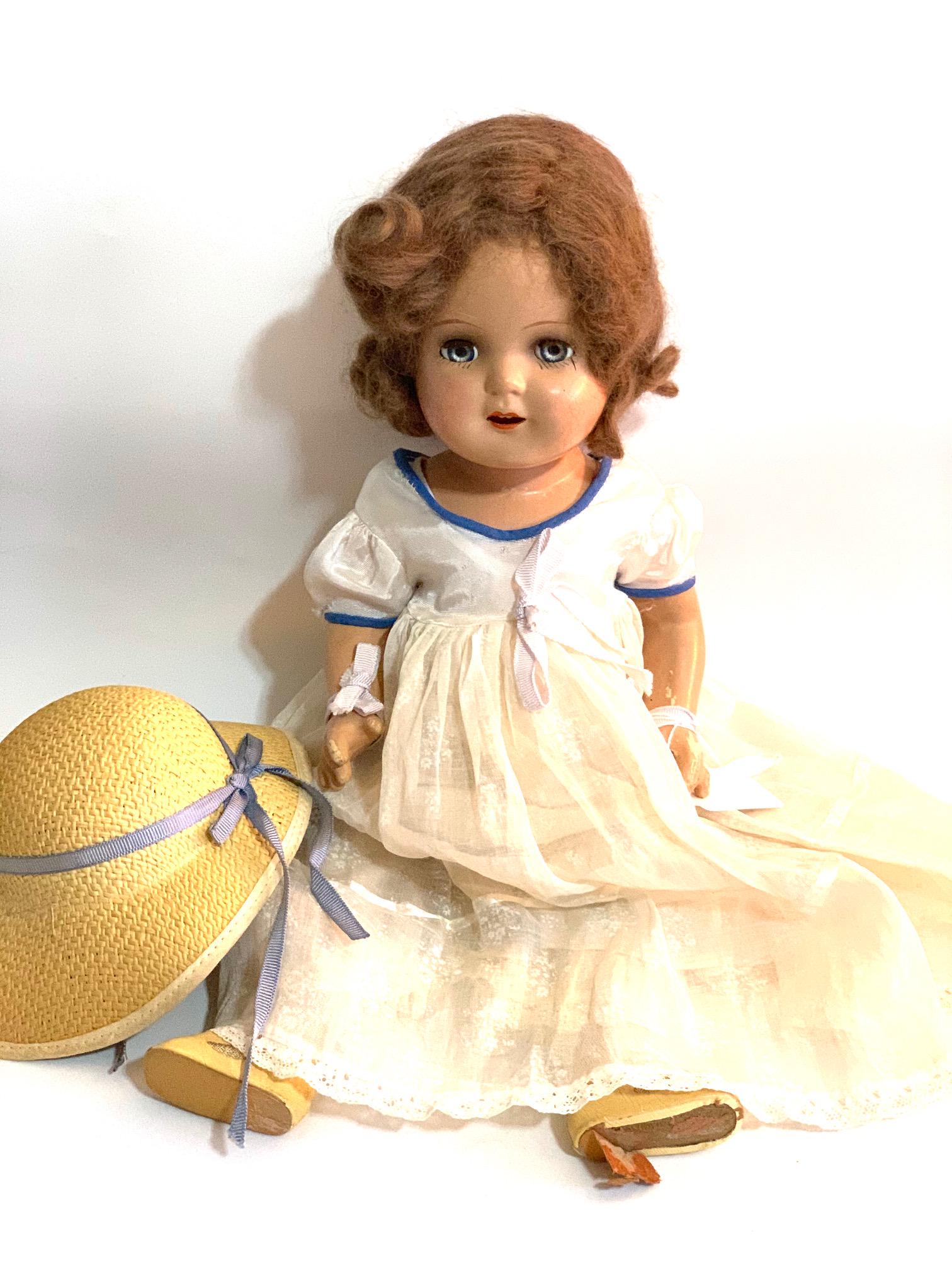 B21: Nancy Arranbee 17" Composition Doll: Nancy Arranbee 17" Composition Doll; all original with original white dress with blue trim; original hat. We do our best to list all possible flaws, these are vintage/antique dolls and are NOT perfect