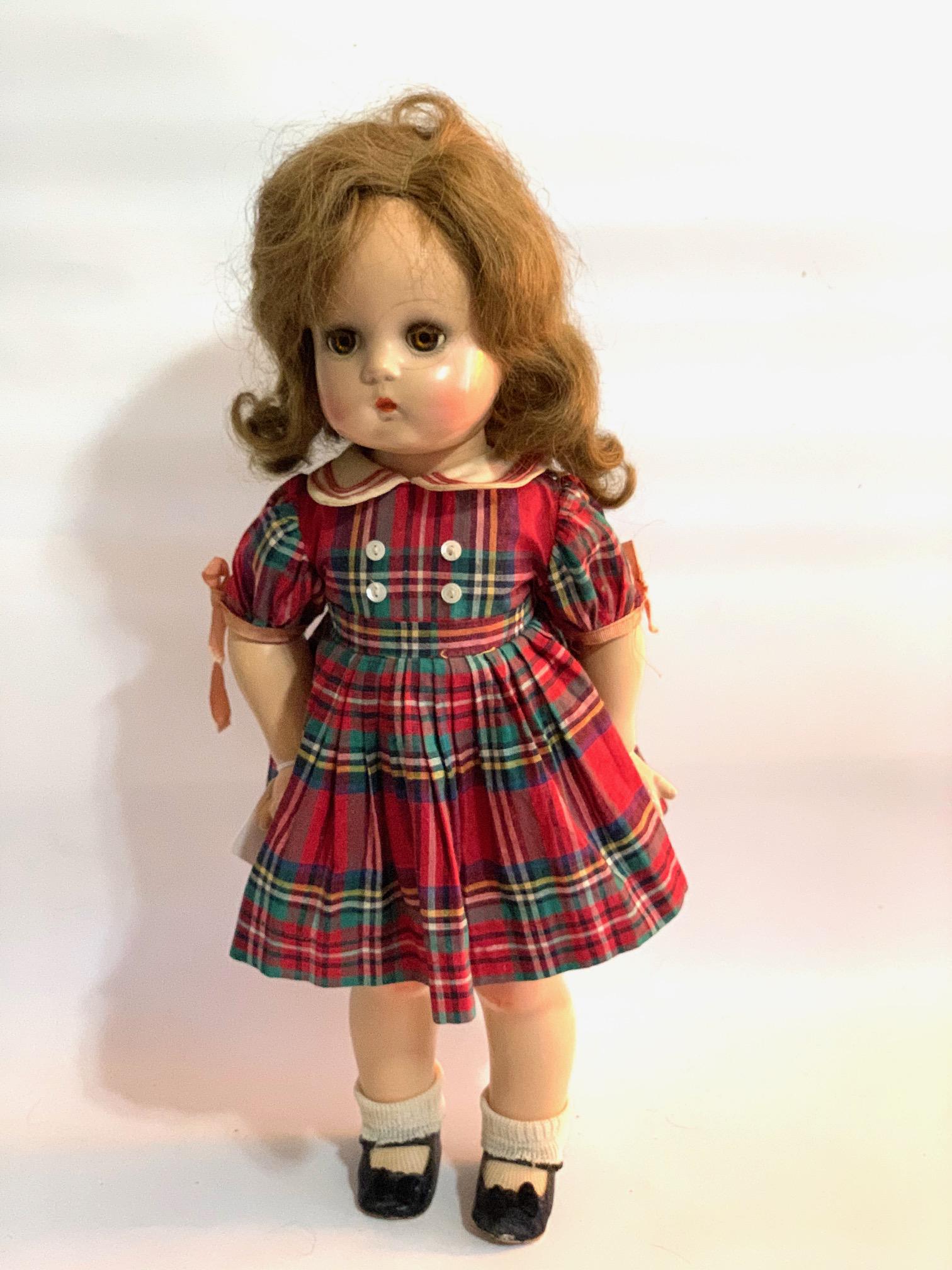 B21: Jeannie Walker 19" Composition Doll: Jeannie Walker 19" Composition Doll original tagged red plaid dress; original shoes and socks; original wig. We do our best to list all possible flaws, these are vintage/antique dolls and are NOT perf
