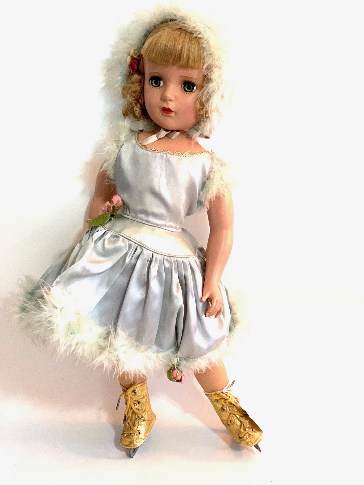 B21: Madame Alexander Babs Skating 18" Hard Plastic: Madame Alexander Babs Skating 18" Hard Plastic Doll; oiginal tagged blue outfit with Marabou trim; original foil skates with some wear; original wig. We do our best to list all possible flaws, these a
