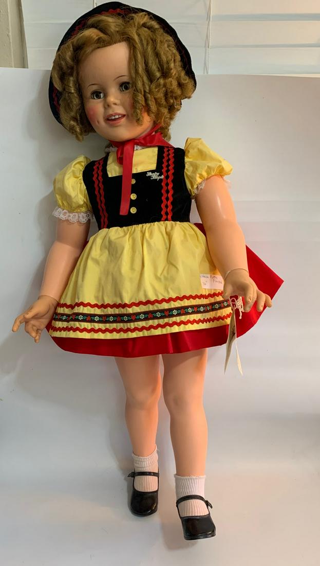 B21: Ideal Heidi Patty Play Pal-1960 Issue: Ideal Heidi Patty Play Pal-1960 issue; 36" Plasic Doll with Hang Tag; reproduced Danbury Mint dress; hat et., with Shirley Temple Pin; original wig. We do our best to list all possible flaws, these ar