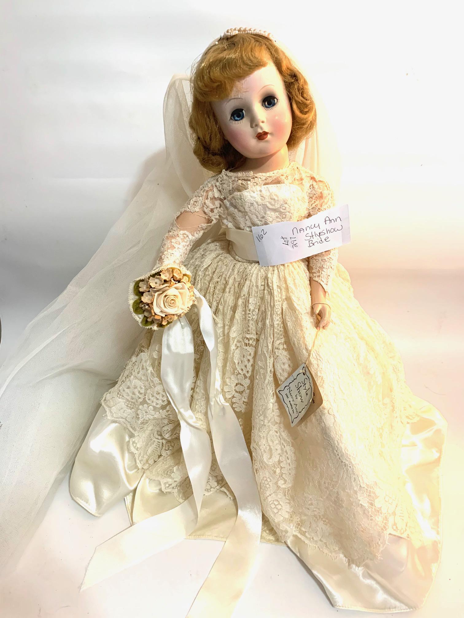 B22: Nancy Ann Story Book Wedding Day Style Show 18": Nancy Ann Story Book Wedding Day Style Show 18" Hard Plastic Doll; some damage to lace on arms; with hang tag; all original wedding dress with veil, underwear; hoop and bouqest; original light brown w