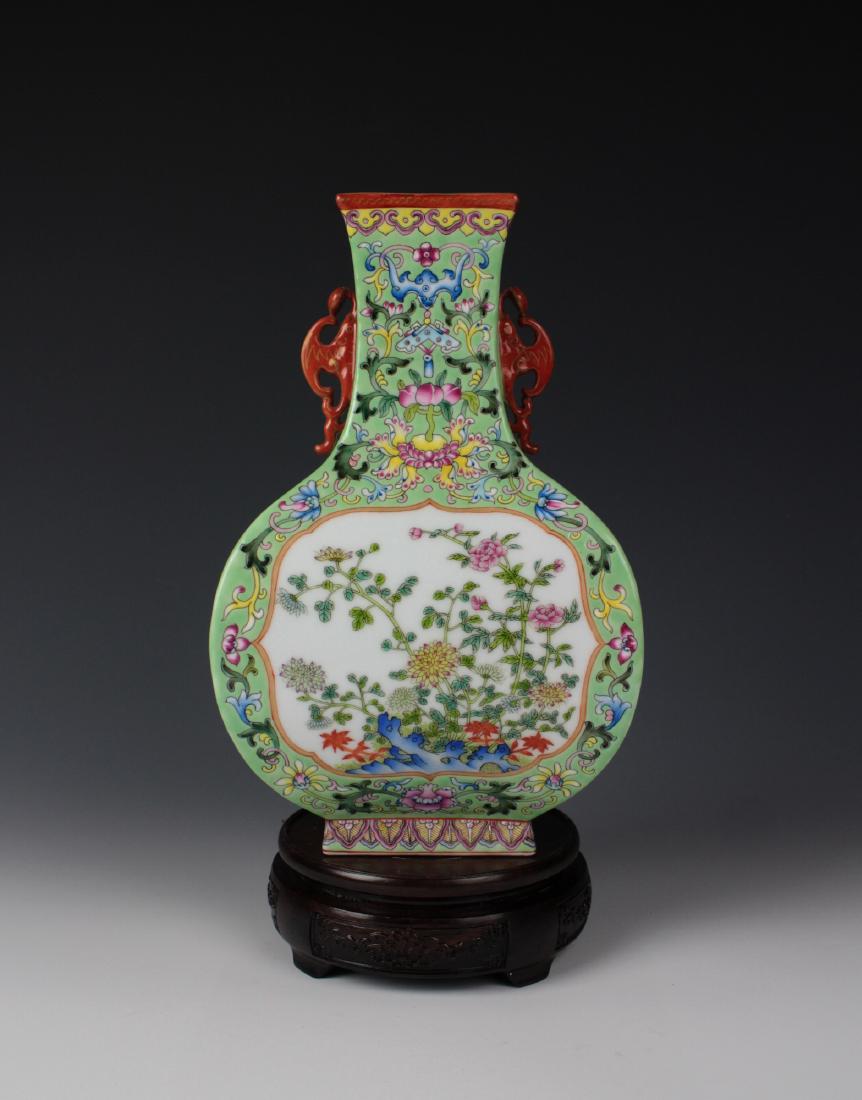 CHINESE PORCELAIN FAMILLE ROSE FLOWER SQUARE VASE: CHINESE PORCELAIN FAMILLE ROSE FLOWER SQUARE VASE. Six character marker on the bottom. H. 28 cm. Diam. 17 cm. Domestic shipping $30 and oversea $100. Combined shipping available. Local pickup at our N