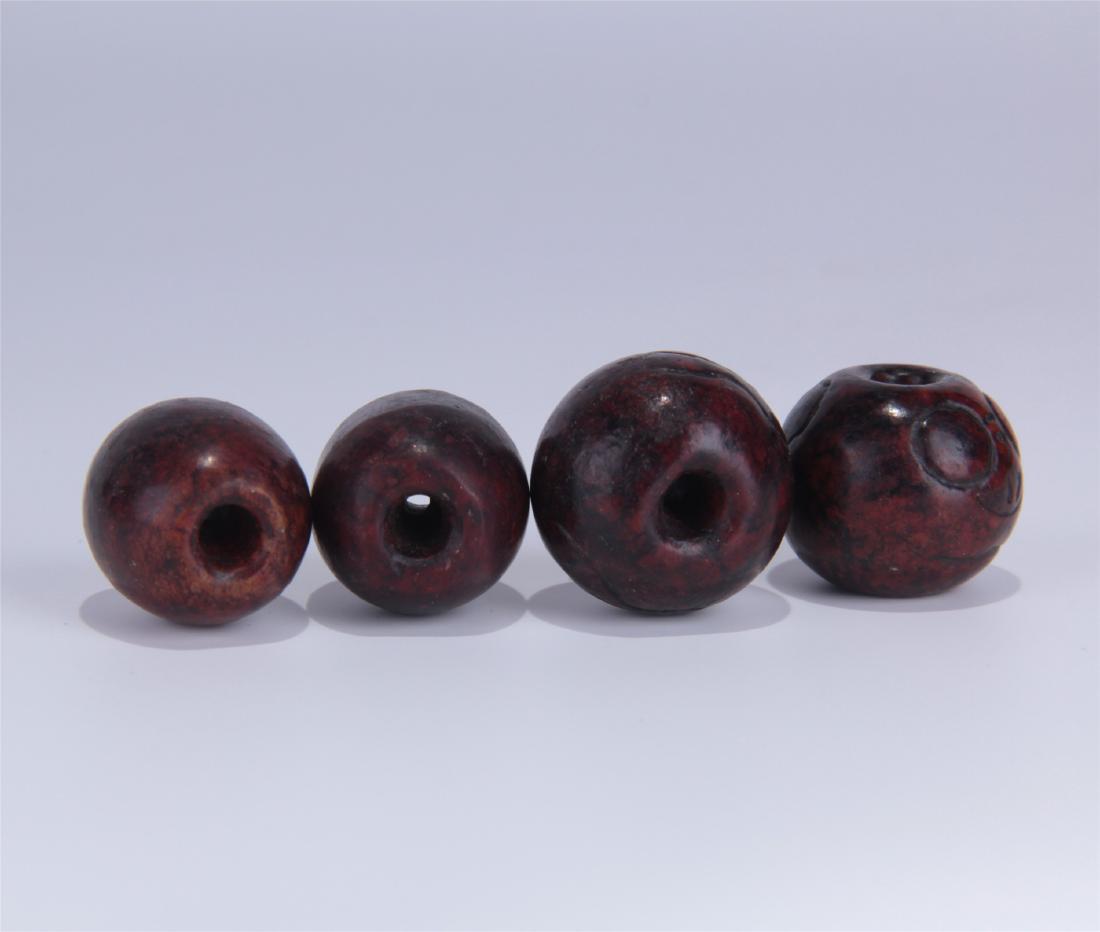 FOUR ANCIENT WOOD BEADS (1 of 6)