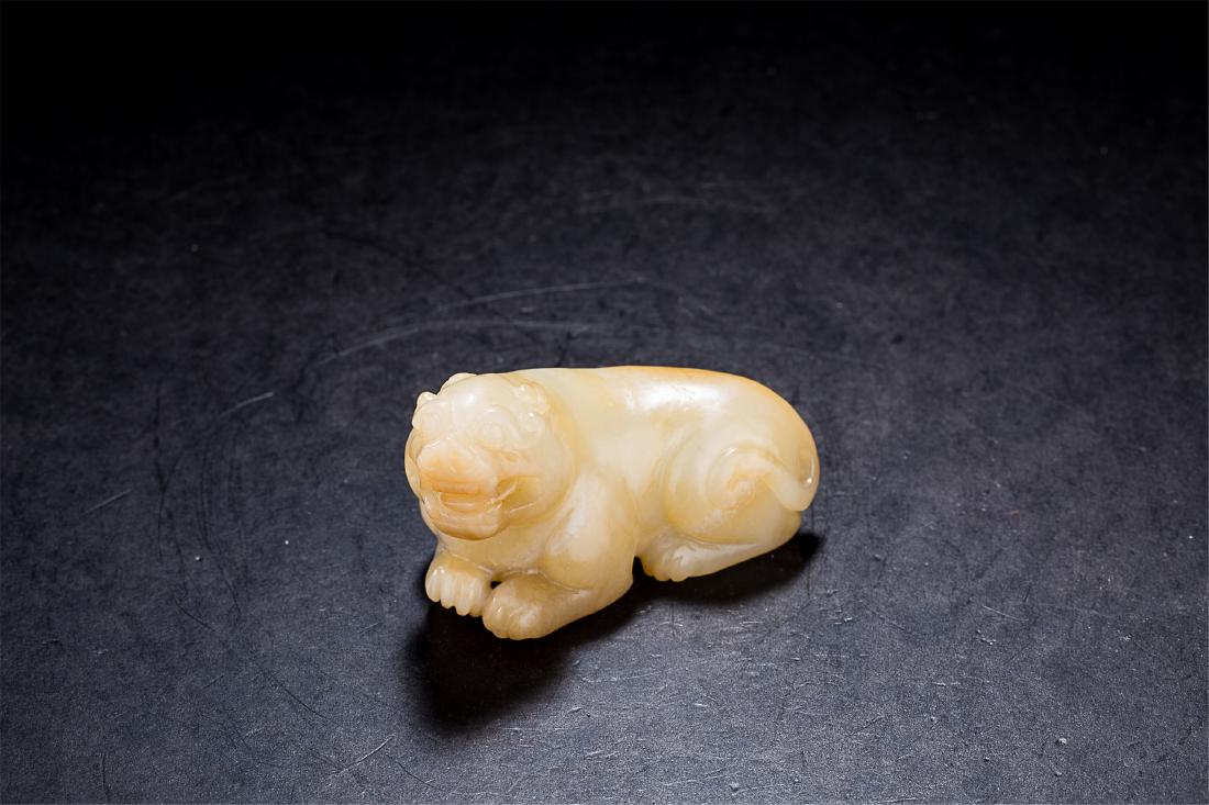 CHINESE JADE COUCHING BEAST: CHINESE JADE COUCHING BEAST. H. 4.7 cm. W. 7.8 cm. T. 3.9 cm. Weight 192 gram. Domestic shipping $20 and oversea $60. Combined shipping available. Local pickup at our NJ warehouse available. Contact u