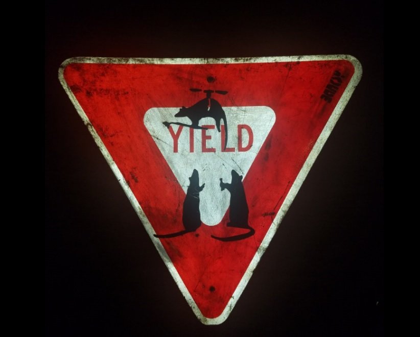 BANKSY street art, on Yield  Sign Traffic (1 of 8)