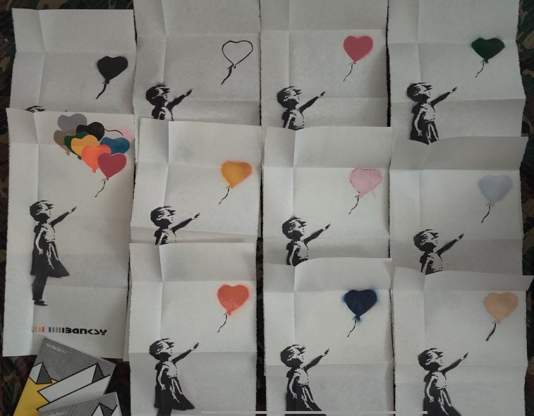 Banksy 11 girl with balloon folded in Sotheby: Banksy 11 girl with balloon folded in Sotheby's auction catalogue (only 1 catalogue included) limited edition spray paint on high quality parchment paper L 37.5 cm x 75.5 cm (14 3/4 x 29 3/4 inches)Th