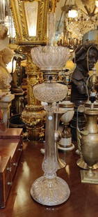 Cut Crystal oil lamp with cut crystal shade chimney: Cut Crystal oil lamp with cut crystal shade chimney. Dimensions: diameter 9 x H 37 inches (This lot is for Cut Crystal oil lamp only, other objects in the photo are NOT included) Condition: good,