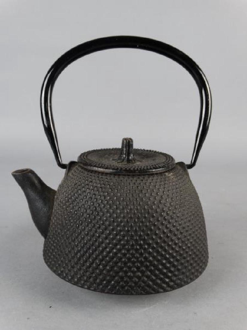 Japanese Cast Iron Teapot: Japanese Cast Iron Teapot Size : 7" to handle.