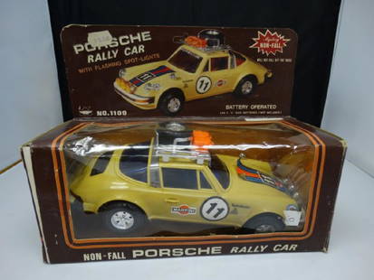 Vintage Battery Operated Porsche 911 Rally Car: Vintage Battery Operated Porsche 911 Rally Car with Mystery Non-Fall Feature and Flashing Lights in Original Box.