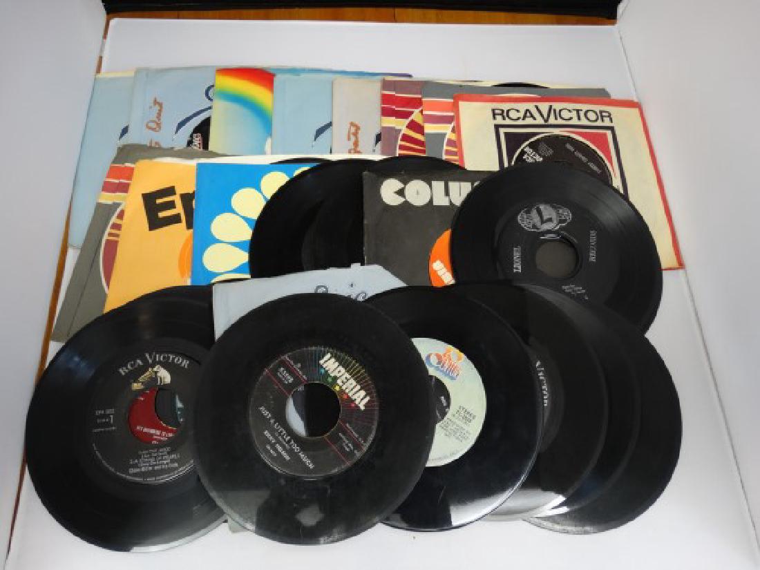 Lot of 25 45RPM Records: Lot of 25 45RPM Records including Merle Haggard, Charley Pride, Ricky Nelson and many more.