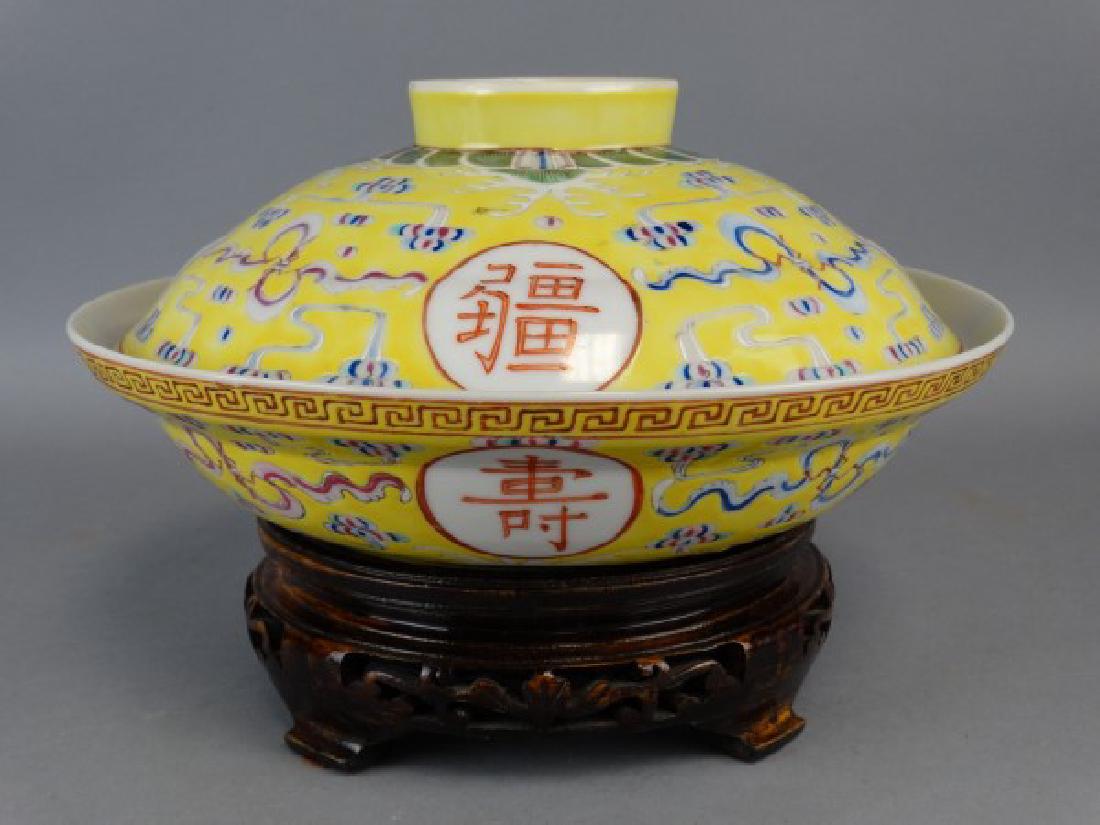 Chinese Yellow Ground Famille Rose Covered Bowl: Chinese Yellow Ground Famille Rose Porcelain 'Birthday' Covered Bowl featuring auspicious motifs over the vibrant enameled yellow ground and encircled by four medallions reading 'Wan', 'Shou', 'Wu' an