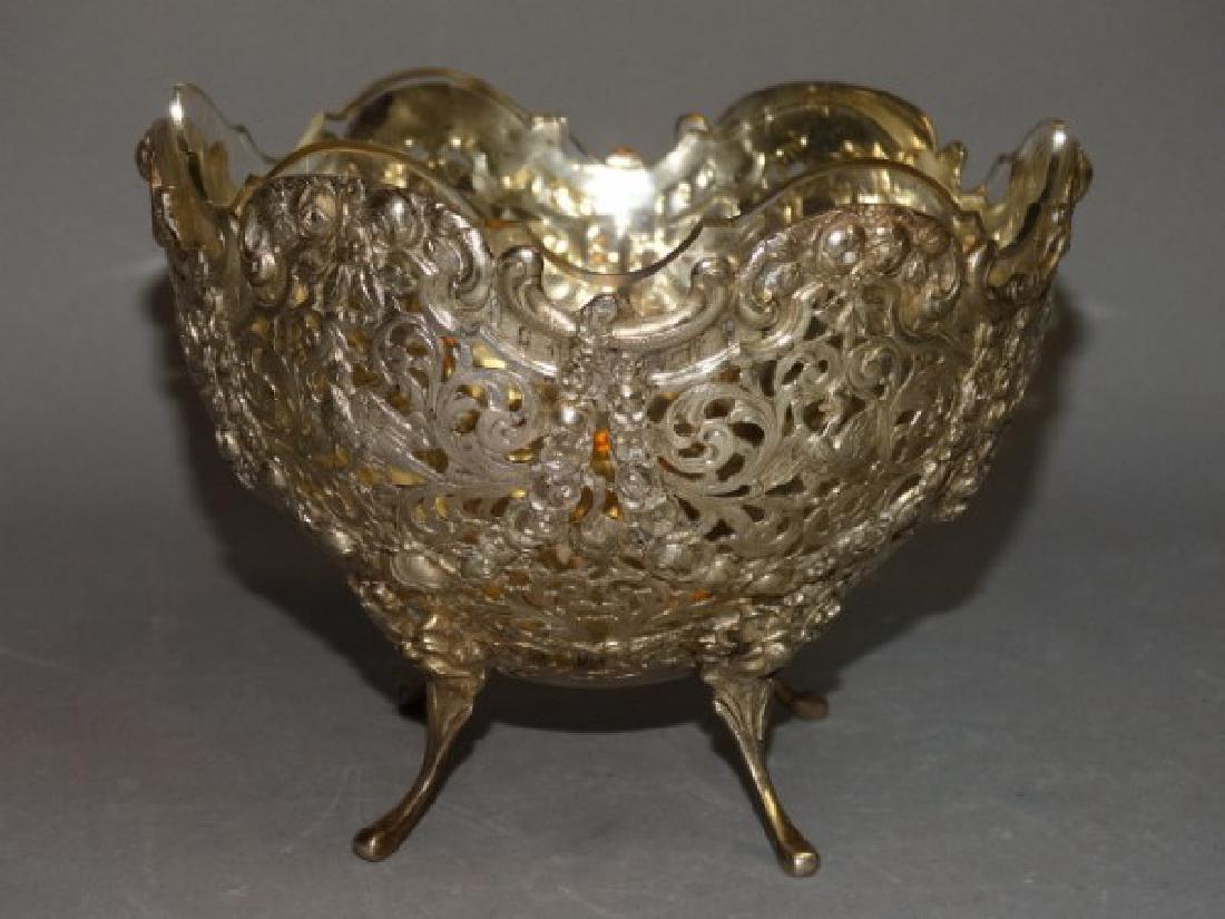 Hanau Silver Reticulated Footed Bowl ca.1900: Hanau Silver Reticulated Footed Bowl ca.1900, bowl features standard 800 Silver done in the Rococo Revival style. Featuring ornate scroll work throughout and rests on 4 scroll legs with angel. Fitted 