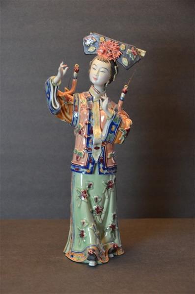 Chinese Shiwan Pottery Figure, Signed Lin Weidong: A finely sculpted modern Chinese Shiwan pottery figure of a lady, bearing incised title and seal mark of master artisan Lin Weidong.