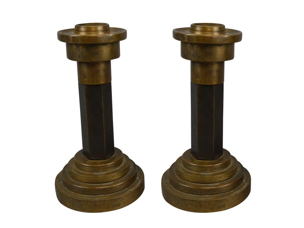 Pair of Bronze Candlesticks Signed - Bomback: Pair of Bronze Candlesticks Signed - Bomback Size: Marked 1948/ 1949 Includes Piece of Tape with Bombacks from E.Evans Contained inside bottom rings of one
